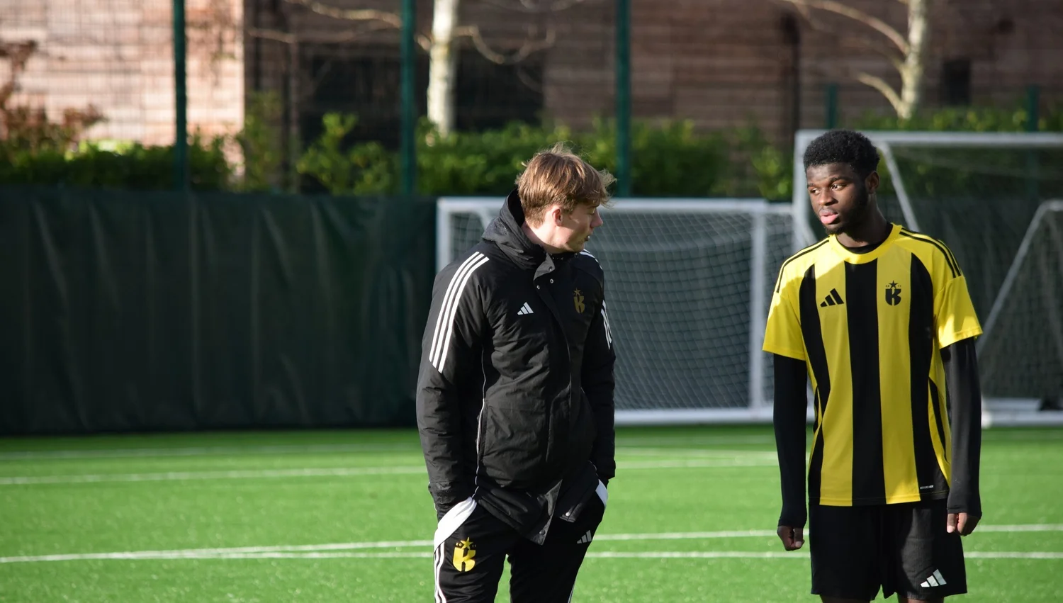 Young players on a training pitch with the Kinetic Foundation in London